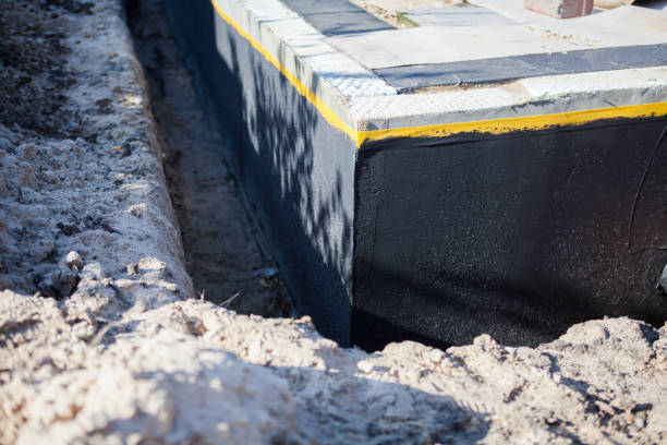 Professional Waterproofing technician working in Sandy Spring, MD